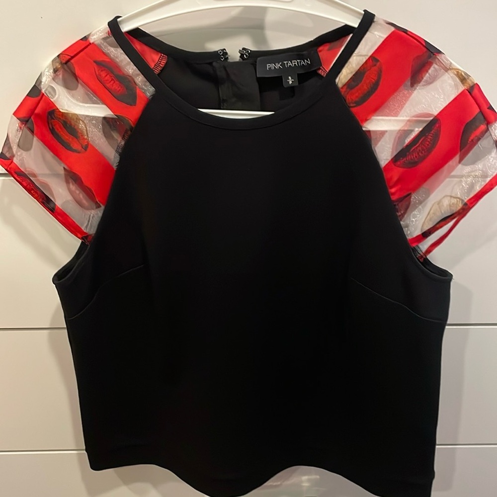 Black size small /petite almost perfect condition worn once - fun top